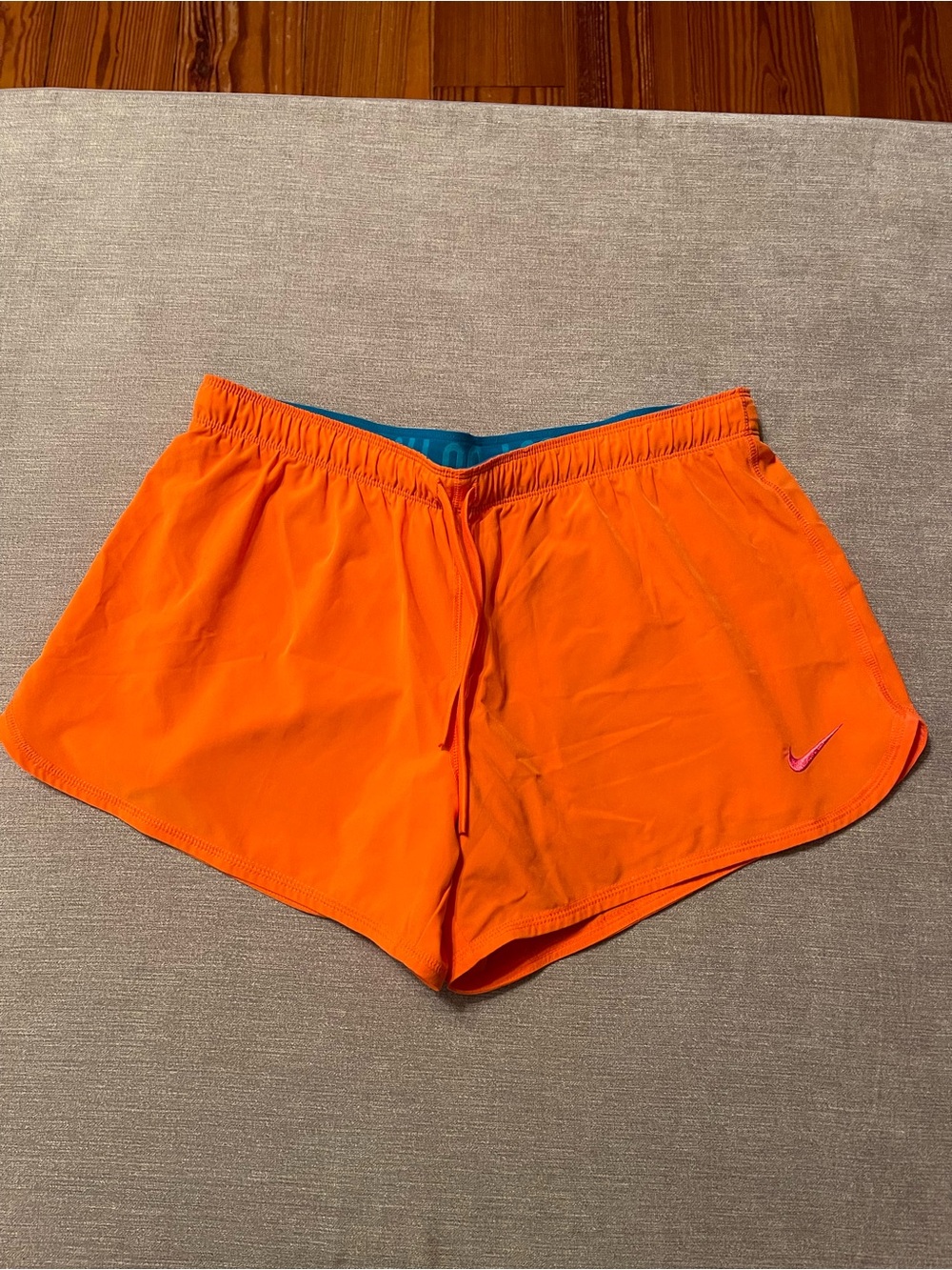 Nike Dri-FIT Women's Bright Orange Running Athletic Shorts with Pink Swoosh